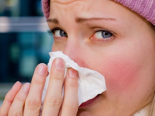 young female having a cold